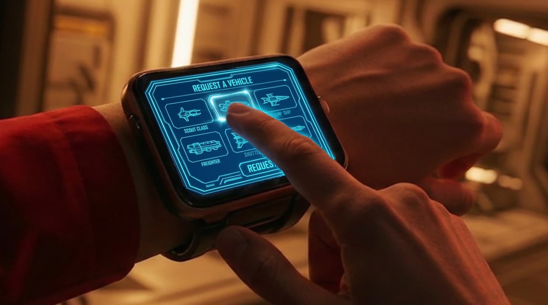 Photoreal close-up of the wrist wearable: a finger taps a ship on the glowing blue Request a Vehicle screen, a warm-lit corridor behind.